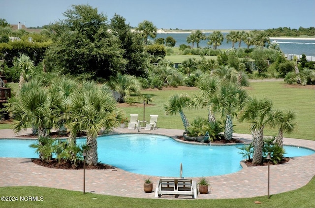 7422 Sea Lilly Ln, Wilmington, NC 28409 - community pool featuring a patio and a yard