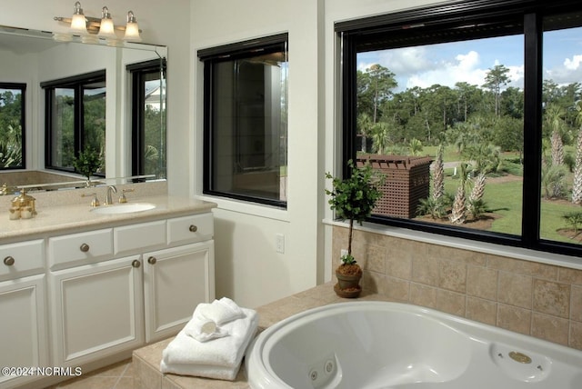 7422 Sea Lilly Ln, Wilmington, NC 28409 - bathroom with a tub with jets and vanity
