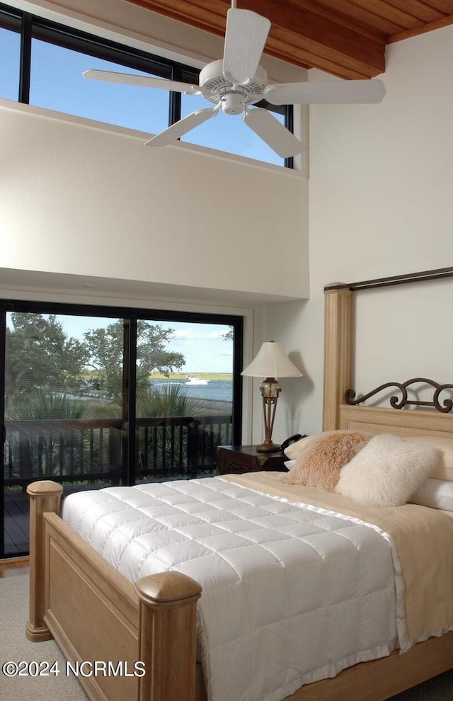 7422 Sea Lilly Ln, Wilmington, NC 28409 - bedroom with beam ceiling and multiple windows