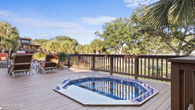 view of pool with a deck