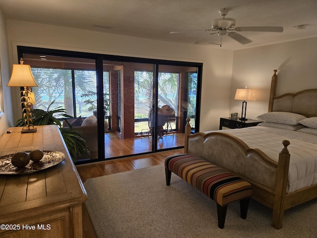 7422 Sea Lilly Ln, Wilmington, NC 28409 - bedroom featuring access to exterior and wood finished floors