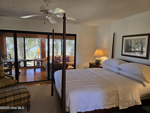 7422 Sea Lilly Ln, Wilmington, NC 28409 - carpeted bedroom featuring visible vents and multiple windows