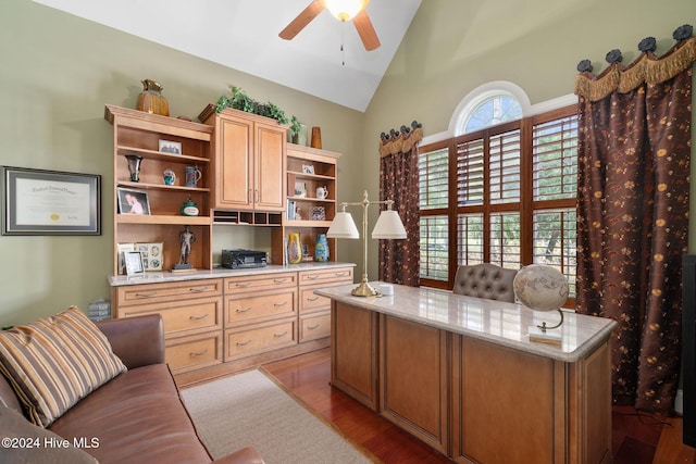 office with ceiling fan, light hardwood / wood-style flooring, and vaulted ceiling