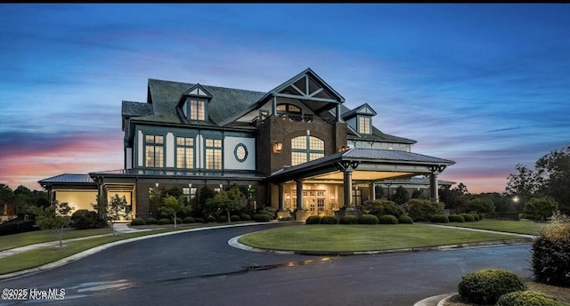 view of front of house with a lawn