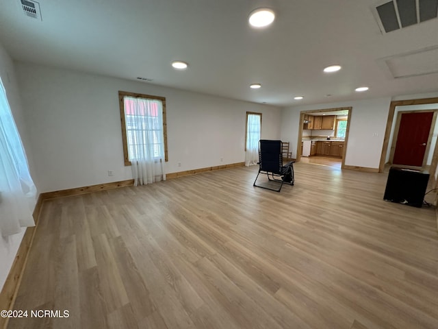 unfurnished living room with light hardwood / wood-style floors