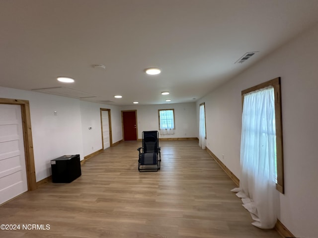 unfurnished living room with light wood-type flooring