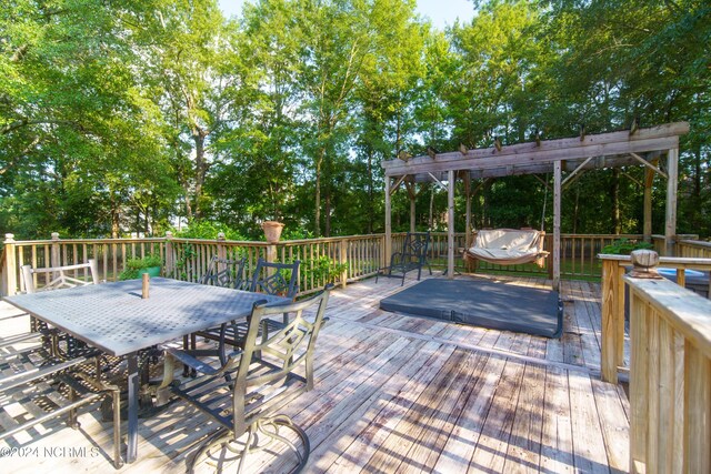 wooden terrace with a pergola