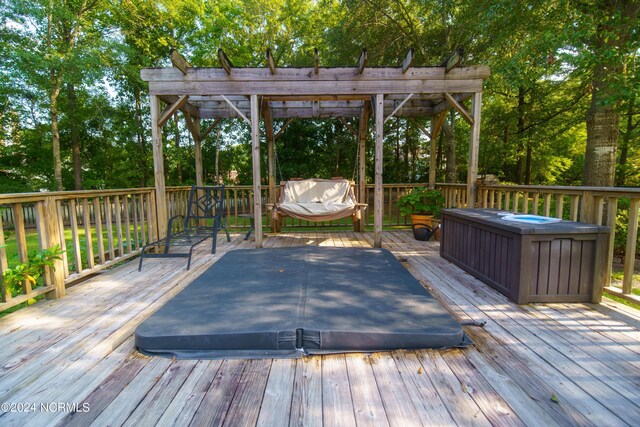 deck featuring a pergola