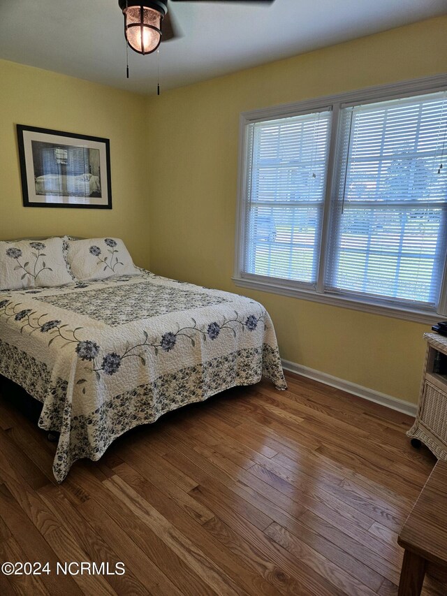 bedroom featuring hardwood / wood-style floors