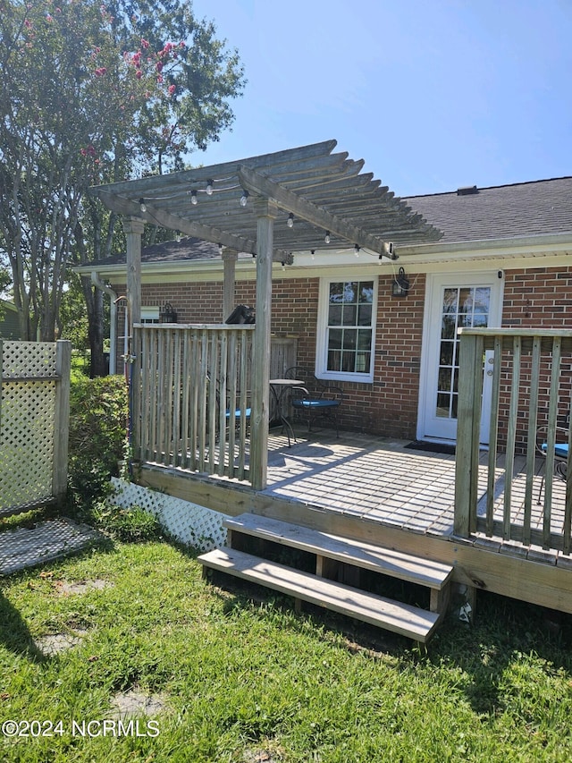 wooden terrace with a pergola