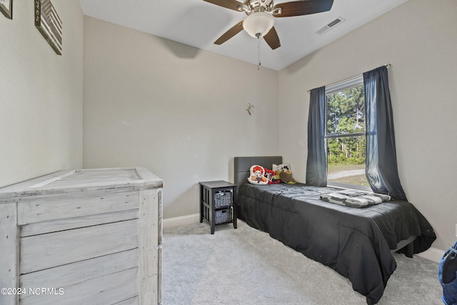 bedroom with visible vents, carpet flooring, a ceiling fan, and baseboards