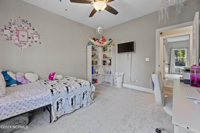 bedroom with baseboards, carpet, and ceiling fan