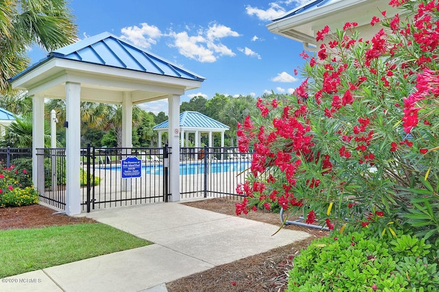 view of swimming pool with a gazebo