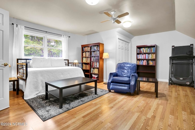 bedroom with a closet, ceiling fan, and light hardwood / wood-style floors