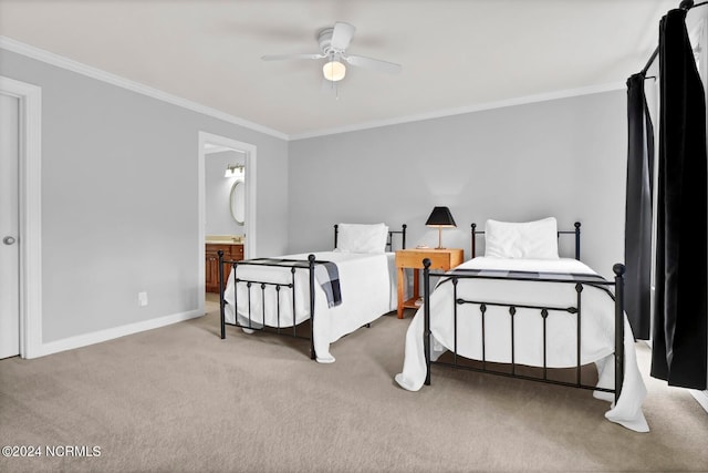 carpeted bedroom with ceiling fan, ensuite bathroom, and crown molding