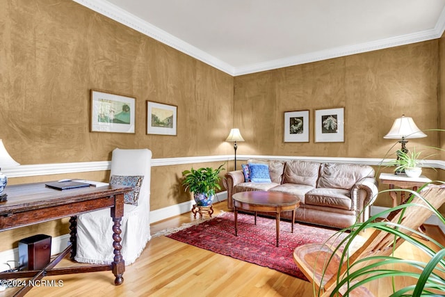 living room featuring ornamental molding and wood-type flooring