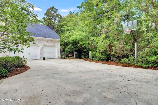 view of side of property featuring a garage