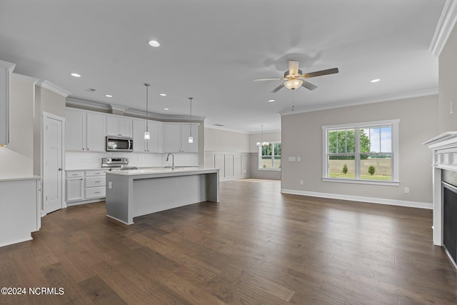 interior space with ornamental molding, a chandelier, and light wood-type flooring