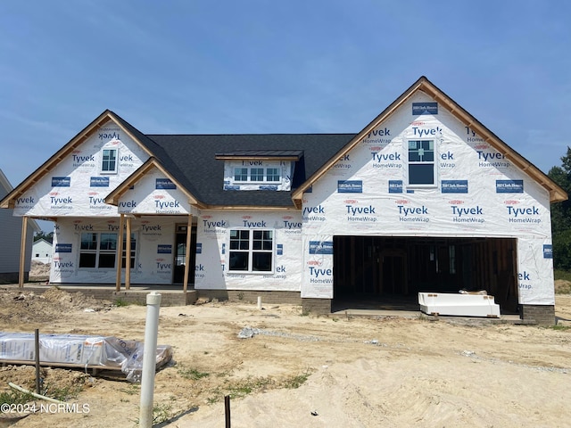 property in mid-construction featuring a garage