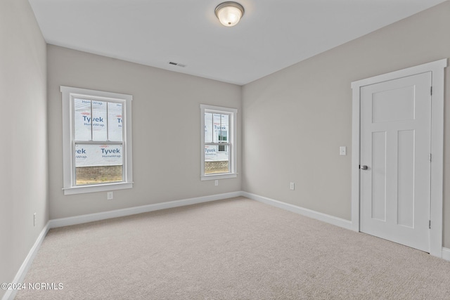 unfurnished bedroom featuring a closet and carpet