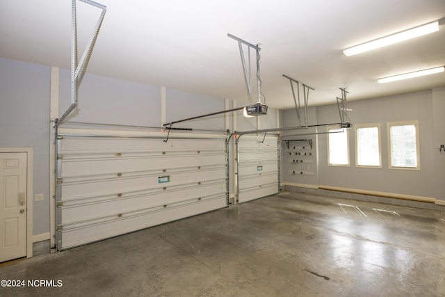 119 Saint Mellions Dr, Pinehurst, NC 28374 - garage featuring a garage door opener