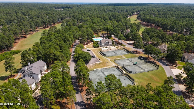 aerial view with a wooded view