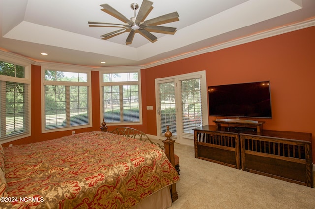 119 Saint Mellions Dr, Pinehurst, NC 28374 - bedroom with ornamental molding, access to outside, a raised ceiling, and light carpet