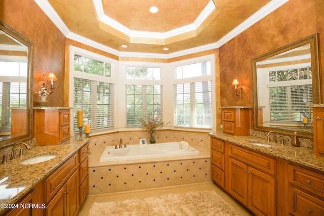 bathroom with ornamental molding, tile patterned flooring, two vanities, and a sink