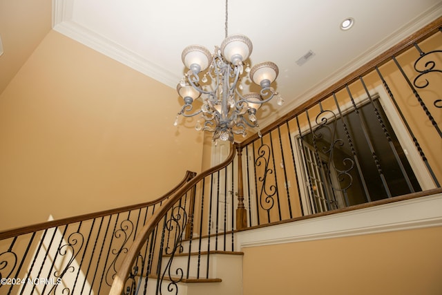 119 Saint Mellions Dr, Pinehurst, NC 28374 - stairway featuring recessed lighting, a notable chandelier, visible vents, and crown molding