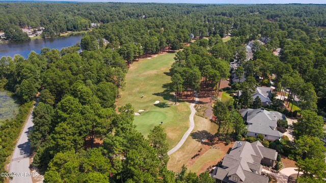 119 Saint Mellions Dr, Pinehurst, NC 28374 - drone / aerial view featuring a forest view, view of golf course, and a water view