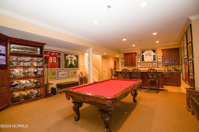 recreation room with light carpet, ornamental molding, and wet bar