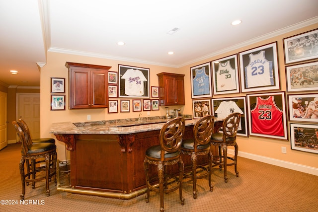 bar with light carpet, baseboards, visible vents, crown molding, and recessed lighting