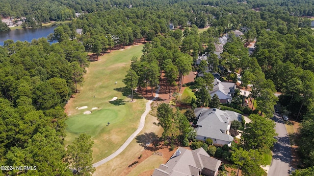 119 Saint Mellions Dr, Pinehurst, NC 28374 - aerial view featuring a wooded view, a water view, and view of golf course