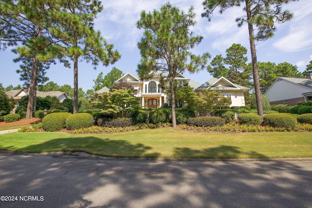 view of front of home with a front yard