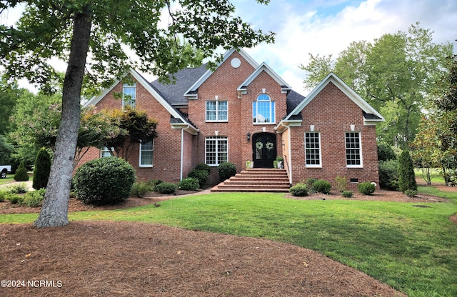 view of front of house with a front yard