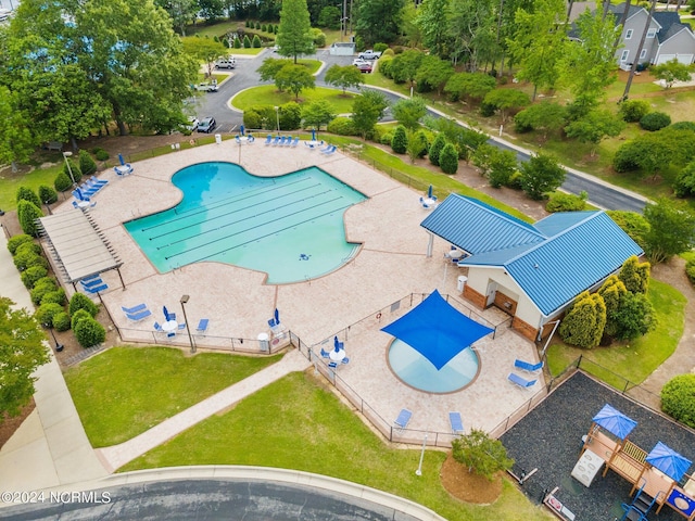 view of pool featuring an enclosed area and fence