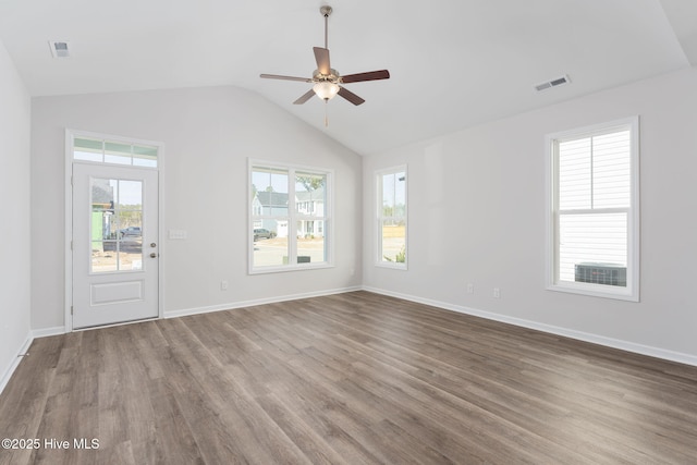 interior space featuring vaulted ceiling, hardwood / wood-style floors, and ceiling fan