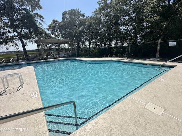 view of pool featuring a pergola