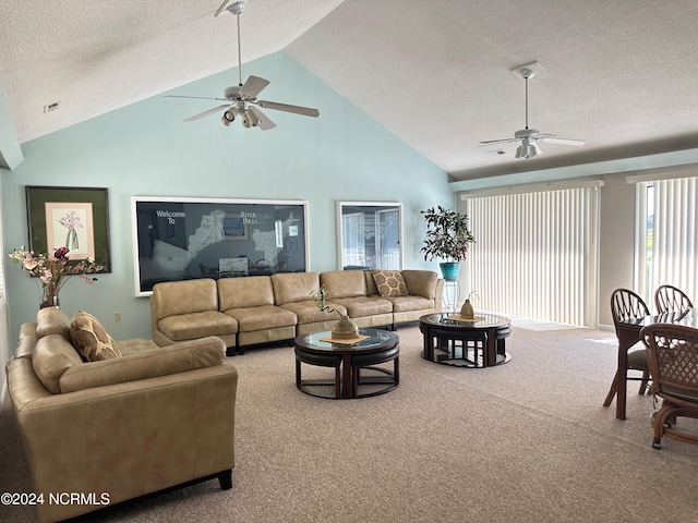 living room with carpet, high vaulted ceiling, a textured ceiling, and ceiling fan