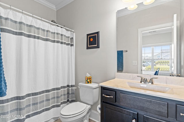 bathroom with vanity, ornamental molding, toilet, and walk in shower