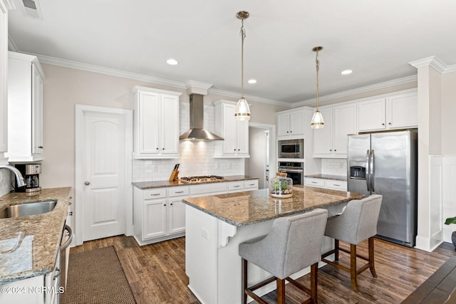 kitchen featuring white cabinetry, stainless steel appliances, wall chimney range hood, and dark hardwood / wood-style floors