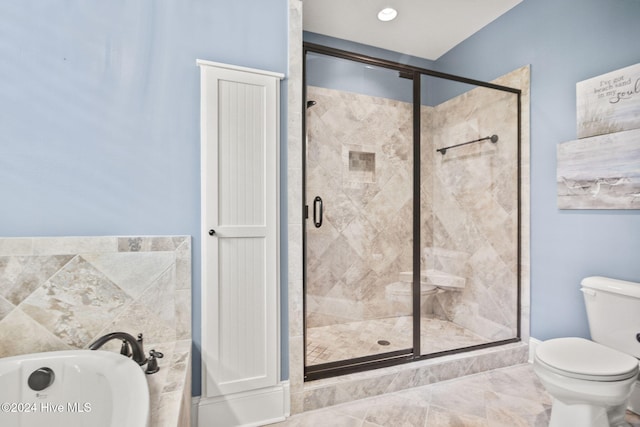 bathroom featuring toilet, plus walk in shower, and tile patterned floors