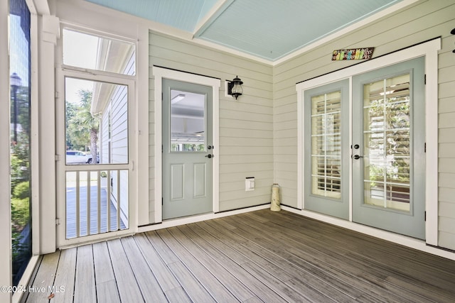 unfurnished sunroom with a wealth of natural light