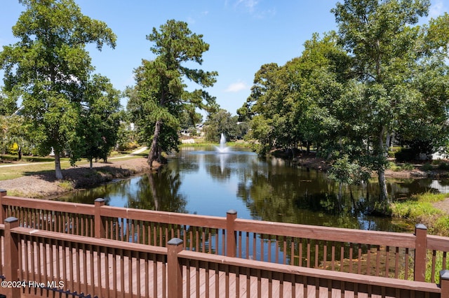 deck featuring a water view