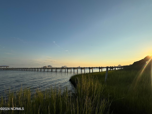 property view of water featuring a dock