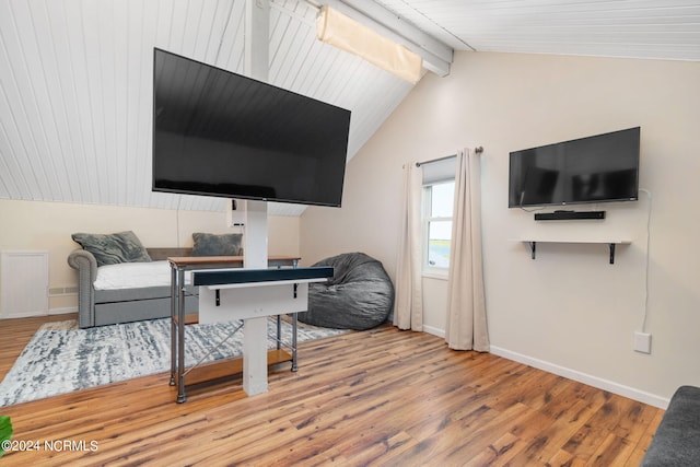 living room featuring wood-type flooring, lofted ceiling with beams, and wooden ceiling