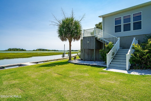 view of yard with a water view