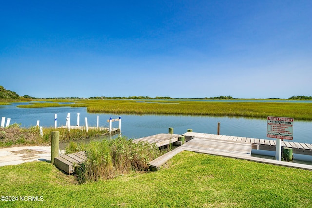 view of dock with a water view