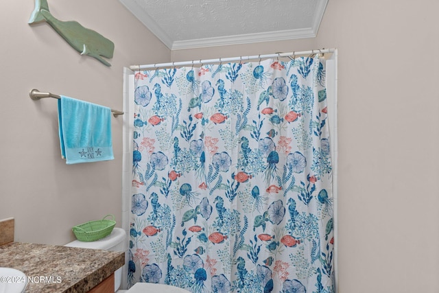 bathroom featuring crown molding, curtained shower, toilet, a textured ceiling, and vanity