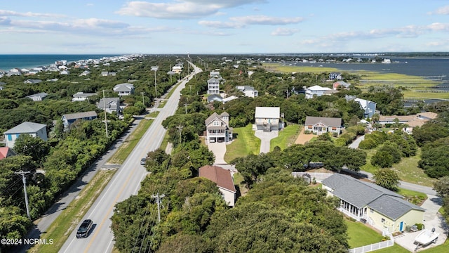 aerial view with a water view and a residential view